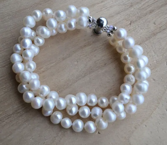 New Arriver Pearl Jewellery,8inches 3 Rows AAA 6-7MM Top Quality Natural Freshwater Pearl Bracelet,Magnet Clasp
New Arriver Pearl Jewellery,8inches 3 Rows AAA 6-7MM Top Quality Natural Freshwater Pearl Bracelet,Magnet Clasp
