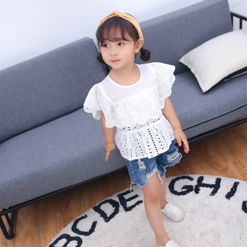 2018 New Summer Girl Shirts Blouse Children's Clothing Baby Small Fresh White Hollow Blouse Lotus Leaf Collar Cute Pullover Tops
2018 New Summer Girl Shirts Blouse Children's Clothing Baby Small Fresh White Hollow Blouse Lotus Leaf Collar Cute Pullover Tops