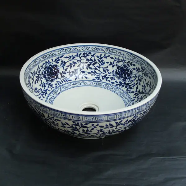 Artistic hand painted ceramic blue and white porcelain washbasin in bathroom and toilet
Artistic hand painted ceramic blue and white porcelain washbasin in bathroom and toilet