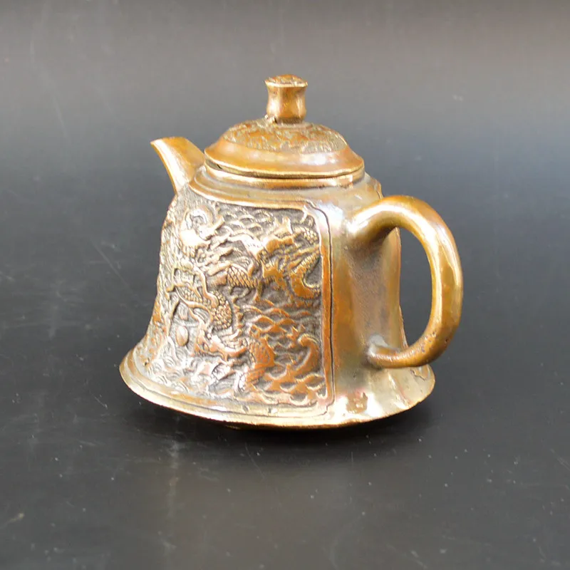 Pure bronze, Ming Dynasty, Hong De, Kowloon, the sea pot / pot / teapot, collection of handicrafts, home decoration.
Pure bronze, Ming Dynasty, Hong De, Kowloon, the sea pot / pot / teapot, collection of handicrafts, home decoration.