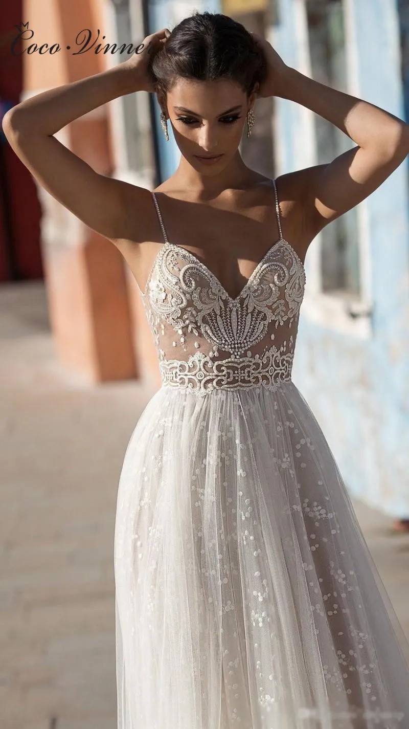 

Sexy Illusion Travel Wedding Dress Beach Wedding Gown Beautiful Pearls Beading Straps Tulle Sweep Train Arab Wedding Dresses New