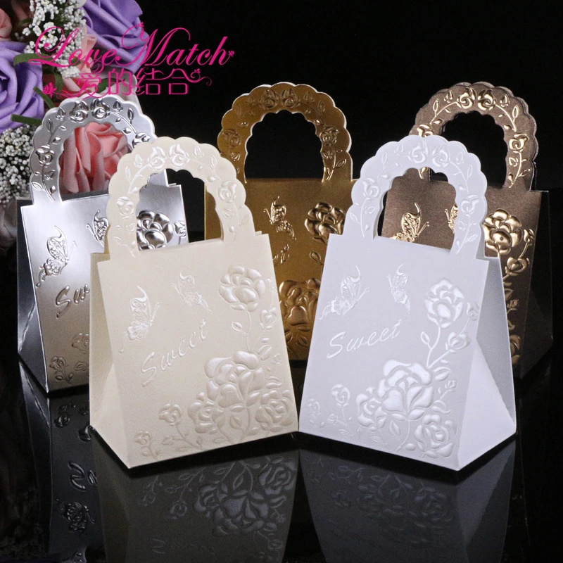 25Pcs Handbag Design Paper Candy Box,Sweet Flower Gift Box For Baby Shower,Wedding Candy Box With Garlands,Event Party Supplies
25Pcs Handbag Design Paper Candy Box,Sweet Flower Gift Box For Baby Shower,Wedding Candy Box With Garlands,Event Party Supplies