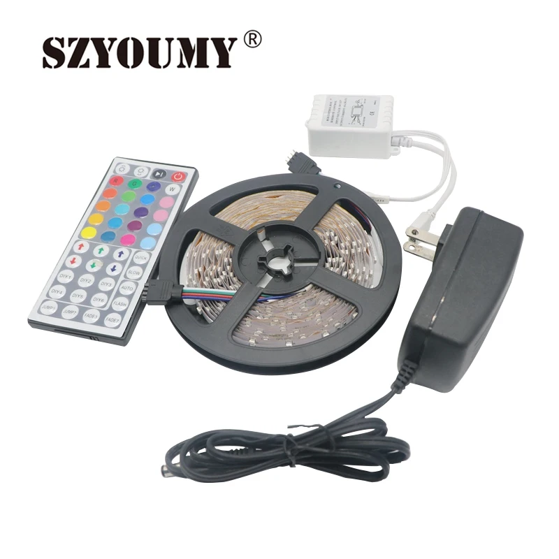 

SZYOUMY Colorful 5M 3528 SMD RGB 300 LED Strip Flexible IP20 Light with 44key Remote Controller DC12V with 2A Adapter