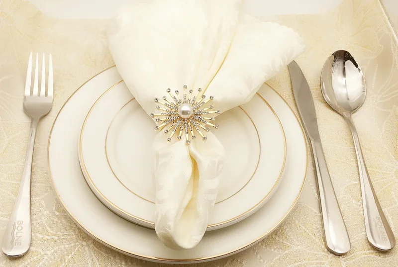 100pcs Pearl sun flower hotel restaurant napkin buckle model room napkin ring mouth circle diamond, wedding party decorations
100pcs Pearl sun flower hotel restaurant napkin buckle model room napkin ring mouth circle diamond, wedding party decorations