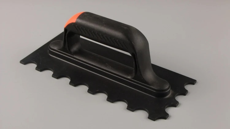 Plastic sawtooth plastering knife Scraper trowel ceramic tile Bricklaying cutter construction tool
Plastic sawtooth plastering knife Scraper trowel ceramic tile Bricklaying cutter construction tool