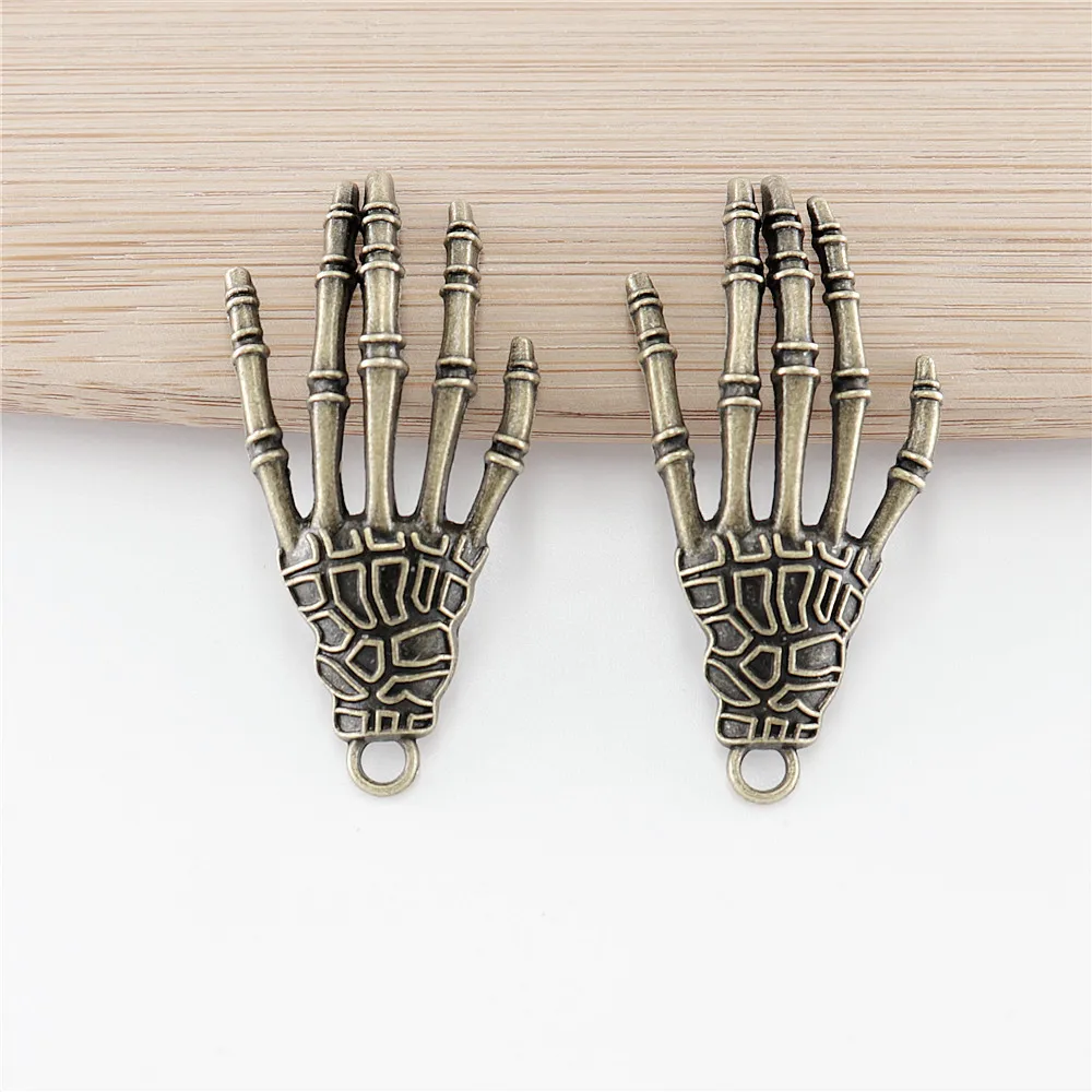 Wholessale 22pcs/lot antique bronze charms Skeleton Hand pendants for DIY metal jewelry making
Wholessale 22pcs/lot antique bronze charms Skeleton Hand pendants for DIY metal jewelry making