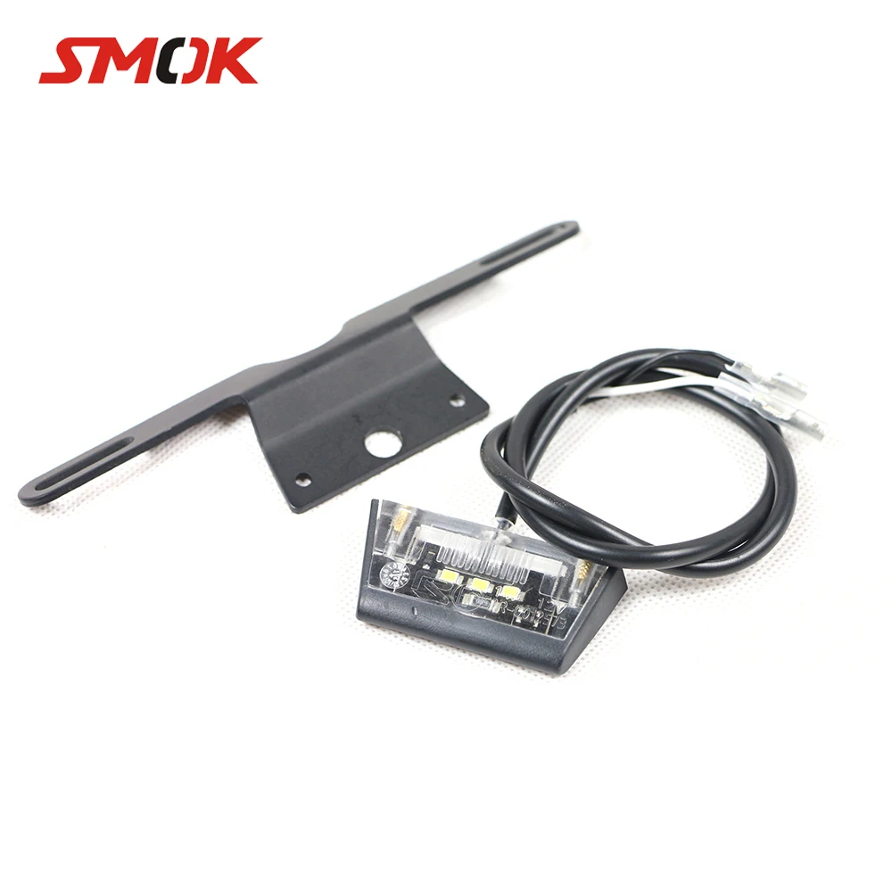 SMOK Motorcycle License Plate Holder LED Light For Honda CB 400 CBR 125 Yamaha XT 600 DT 125 Fazer FZ6 BMW S1000R Aprilia RS 125
SMOK Motorcycle License Plate Holder LED Light For Honda CB 400 CBR 125 Yamaha XT 600 DT 125 Fazer FZ6 BMW S1000R Aprilia RS 125