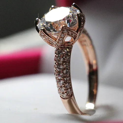 Качество 14K розовый Золотой лотос микро проложенный 4CT славное надежное бриллиантовое кольцо для женщин Свадебные ювелирные изделия
Качество 14K розовый Золотой лотос микро проложенный 4CT славное надежное бриллиантовое кольцо для женщин Свадебные ювелирные изделия