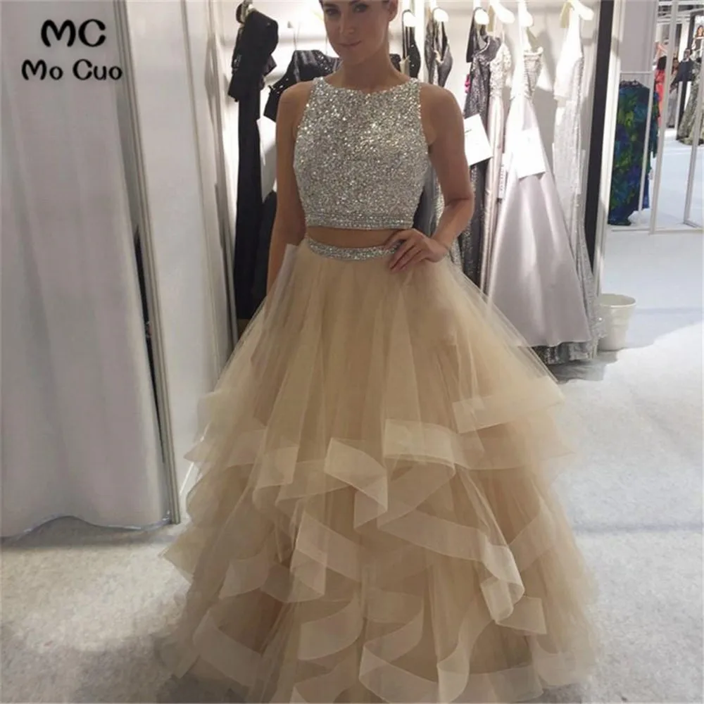 Sparkly Prom Dresses with Crystals Beaded Two Pieces Gown Evening Gown Ball Gown Ruffles Prom Dress for women Custom Made
Sparkly Prom Dresses with Crystals Beaded Two Pieces Gown Evening Gown Ball Gown Ruffles Prom Dress for women Custom Made