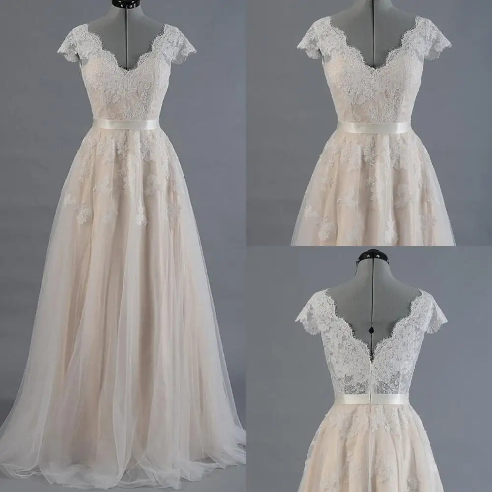Vestido De Novia кружево пляжные свадебные платья с короткими рукавами с v-образным вырезом на спине, свадебное платье с аппликацией летнее платье ...
Vestido De Novia кружево пляжные свадебные платья с короткими рукавами с v-образным вырезом на спине, свадебное платье с аппликацией летнее платье ...