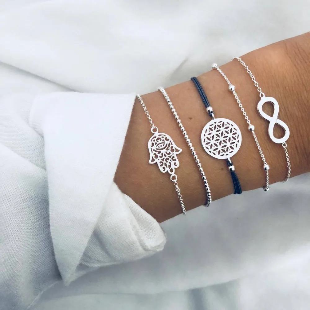 Pack Of 5 bangle bracelet with beads and embossed palm/digit 8 design in mixed link chains
Pack Of 5 bangle bracelet with beads and embossed palm/digit 8 design in mixed link chains