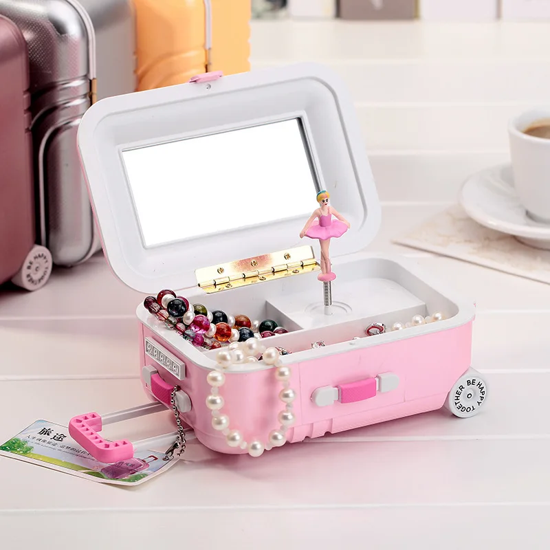 Creative suitcase trolley music box rotating ballet girl creative jewelry box to send girlfriend gift children's toy gift box
Creative suitcase trolley music box rotating ballet girl creative jewelry box to send girlfriend gift children's toy gift box