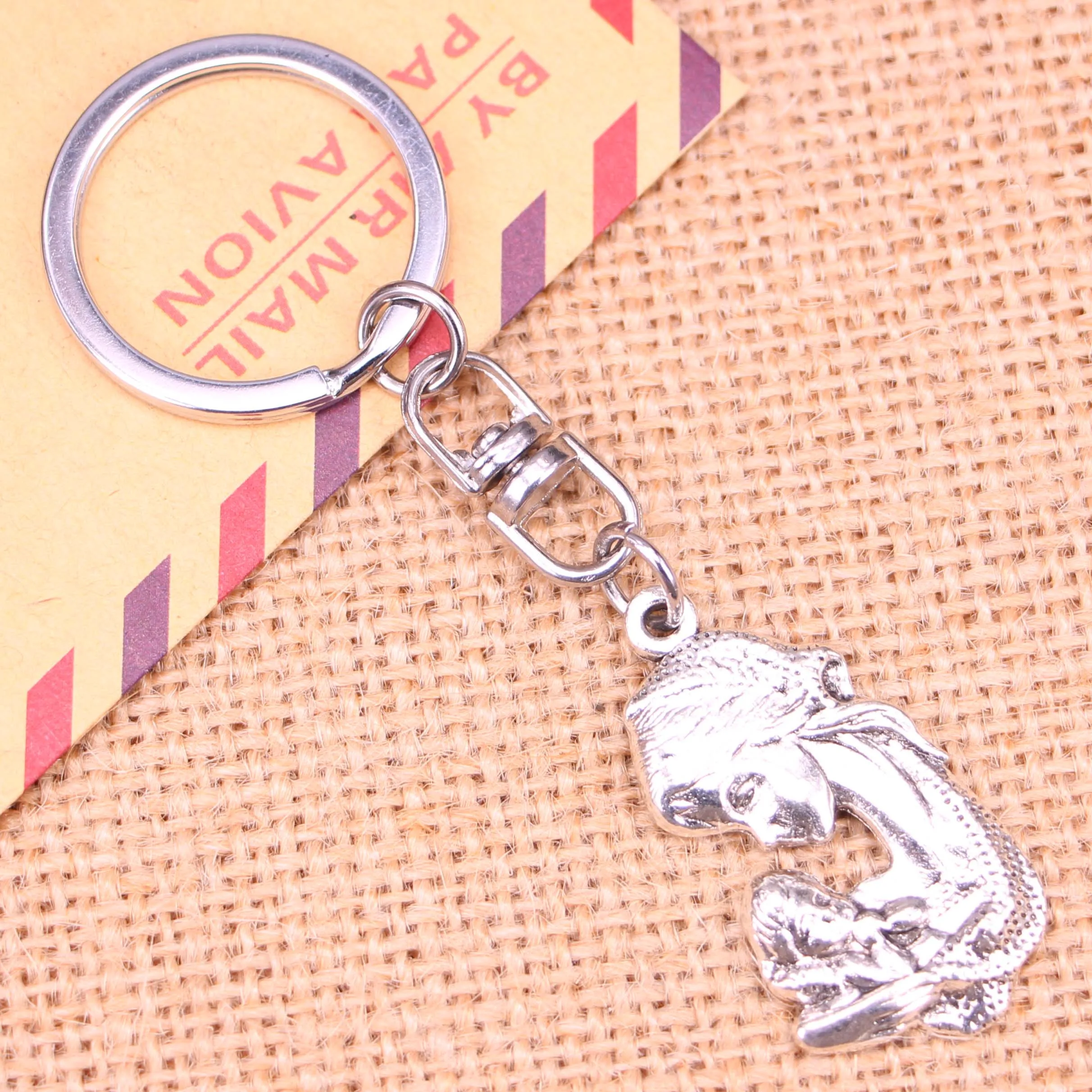 20pcs New Fashion Keychain 37*20 mm mother hold son Pendants DIY Men Jewelry Car Key Chain Ring Holder Souvenir For Gift
20pcs New Fashion Keychain 37*20 mm mother hold son Pendants DIY Men Jewelry Car Key Chain Ring Holder Souvenir For Gift