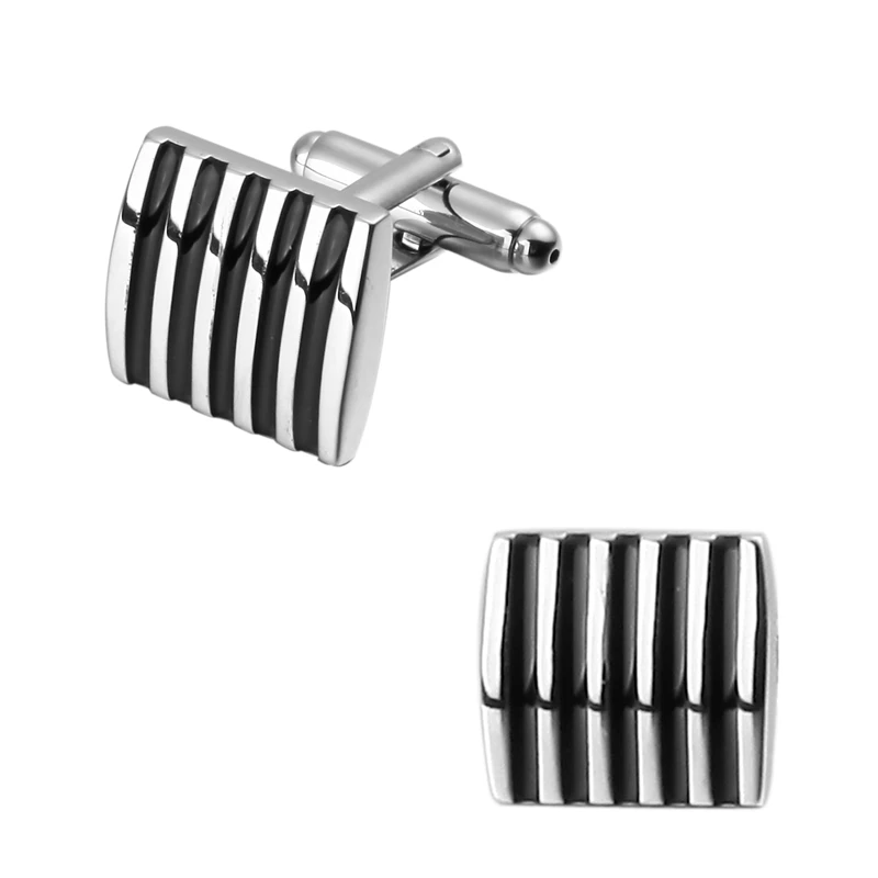 A pair of high quality brass Black Enamel Silvery striped Cufflinks Wedding gift brand men's shirt cuff Cufflinks
A pair of high quality brass Black Enamel Silvery striped Cufflinks Wedding gift brand men's shirt cuff Cufflinks