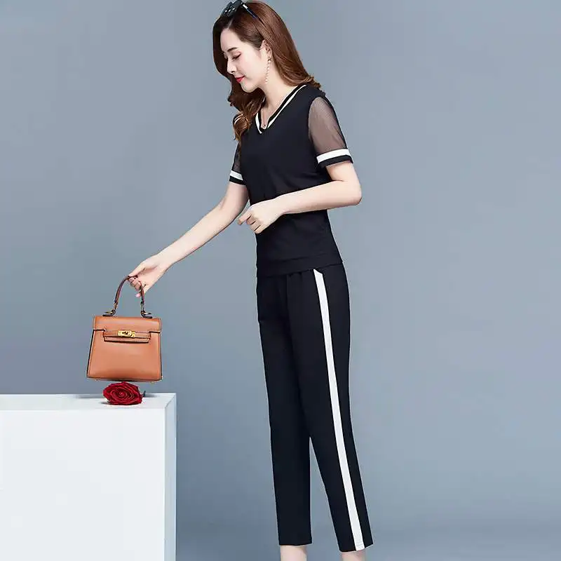 leisure suit female summer new fashion gauze loose big yards pants two-piece clothing set women short sleeves V neck top blouse
leisure suit female summer new fashion gauze loose big yards pants two-piece clothing set women short sleeves V neck top blouse