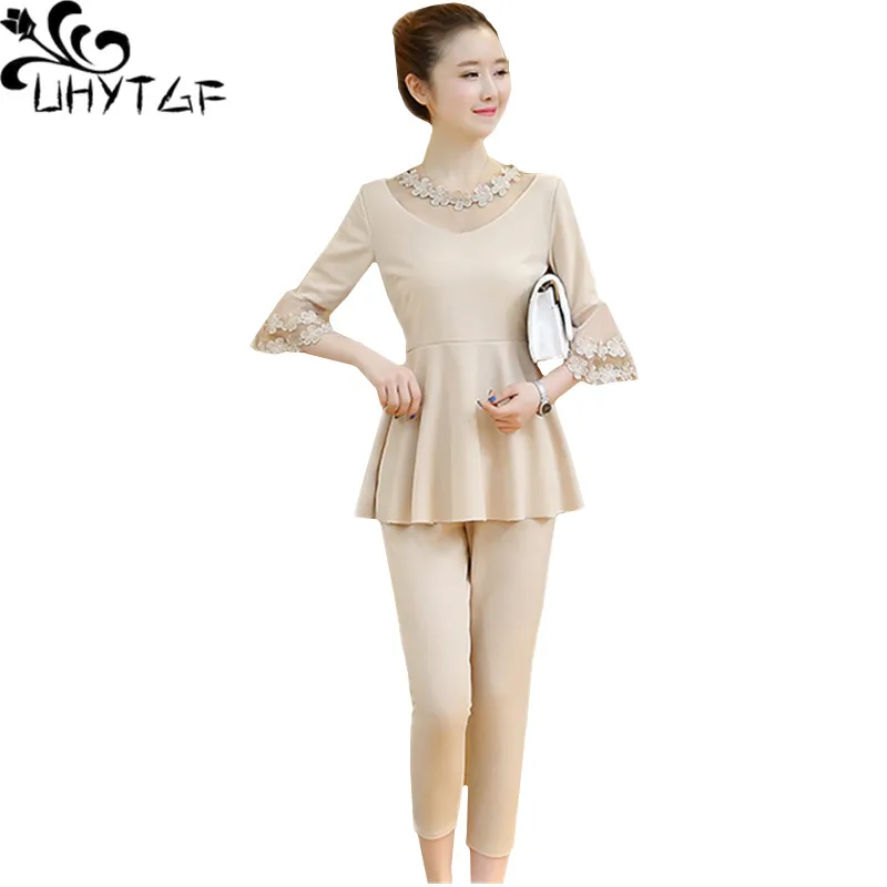 UHYTGF Summer suits for women Fashion trumpet sleeve Ruffle Plus size two piece set top and pants elegant women sports sets 1408
UHYTGF Summer suits for women Fashion trumpet sleeve Ruffle Plus size two piece set top and pants elegant women sports sets 1408