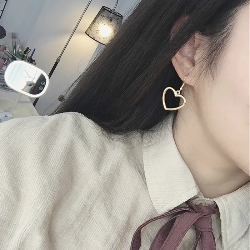 Simple Design Silver Color Hollow Heart Drop Earrings For Women New Brand Fashion Ear Cuff Piercing Dangle Earring Gift
Simple Design Silver Color Hollow Heart Drop Earrings For Women New Brand Fashion Ear Cuff Piercing Dangle Earring Gift