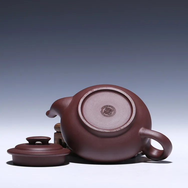 Yixing Zisha pot Folk artist all handmade authentic teapot purple mud heart bridge pot wholesale
Yixing Zisha pot Folk artist all handmade authentic teapot purple mud heart bridge pot wholesale