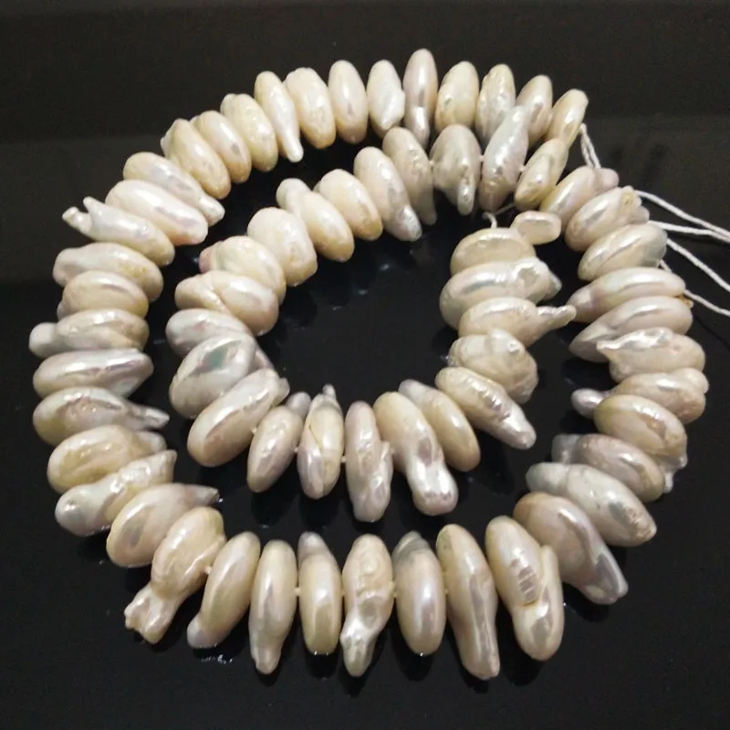 16 inches 16-20mm Natural White Center-Drilled Coin Shaped Large Baroque Pearl Loose Strand
16 inches 16-20mm Natural White Center-Drilled Coin Shaped Large Baroque Pearl Loose Strand