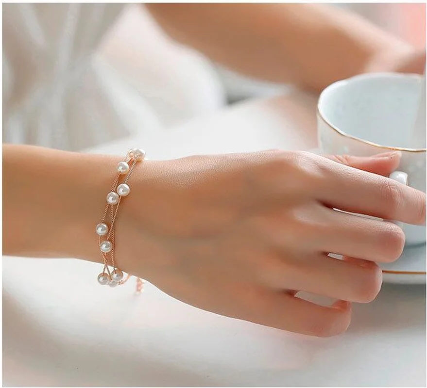 Necklace con perlas de imitacin de oro plata Bracelet moda multicapa collar de joyas de oro conjunto de cristal femenino fiest
Necklace con perlas de imitacin de oro plata Bracelet moda multicapa collar de joyas de oro conjunto de cristal femenino fiest