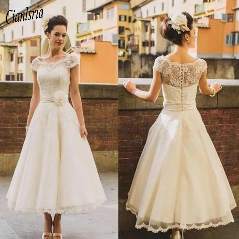 Sheer Neck Lace Tea lengh Wedding Dresses Short Sleeves A Line Bridal Gowns 
Sheer Neck Lace Tea lengh Wedding Dresses Short Sleeves A Line Bridal Gowns