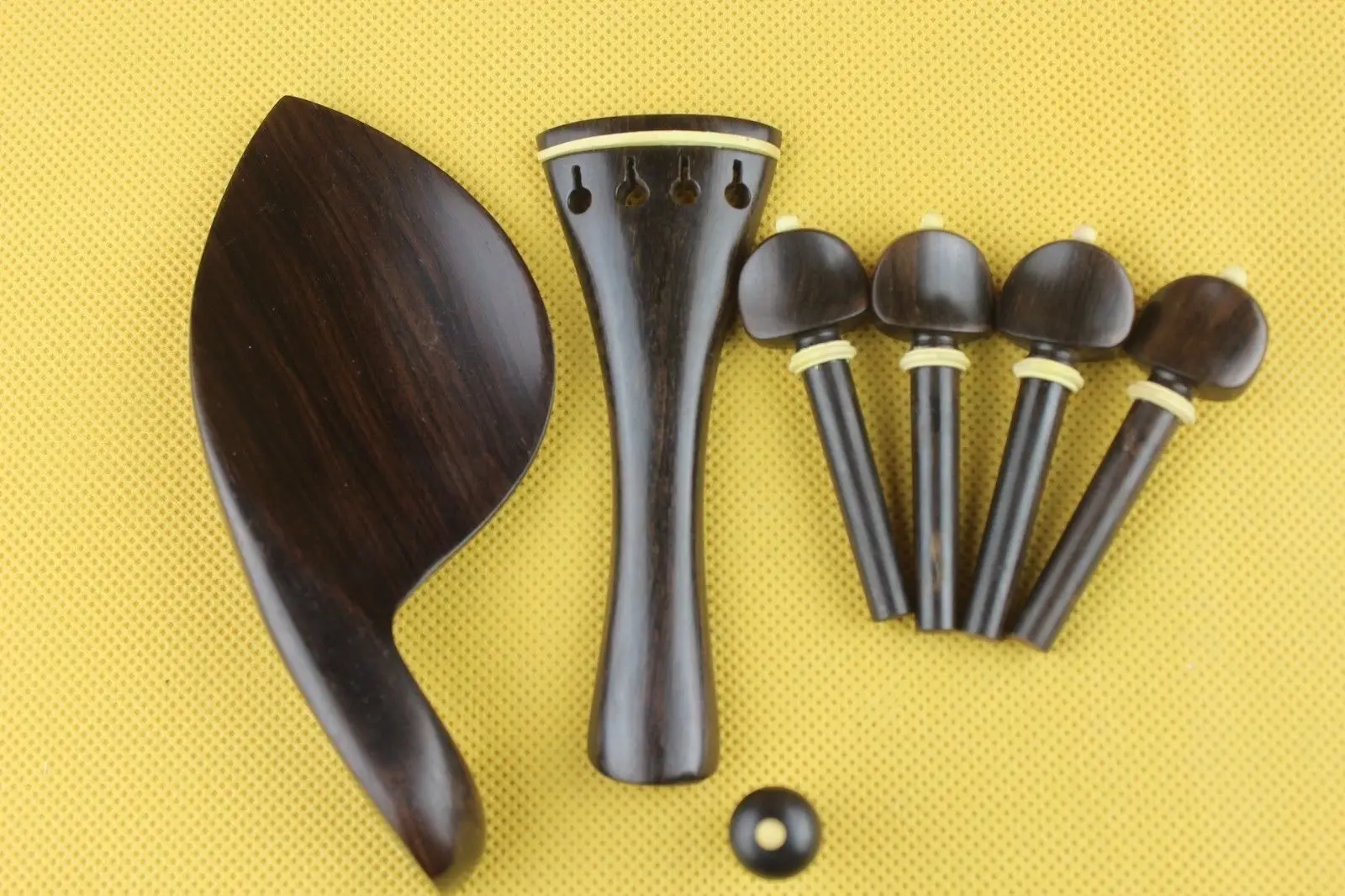 New high quality undyed ebony violin parts 4/4, pegs, tailpiece, chinrest endpin
New high quality undyed ebony violin parts 4/4, pegs, tailpiece, chinrest endpin