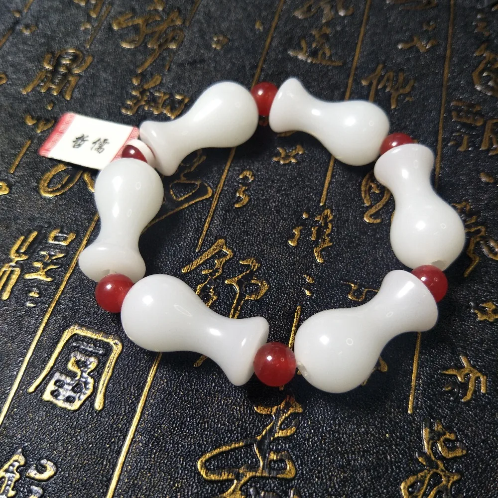 Send A-level national certificate Natural Hetian White Jade Bracelet White Vase Red Bead Bracelet
Send A-level national certificate Natural Hetian White Jade Bracelet White Vase Red Bead Bracelet