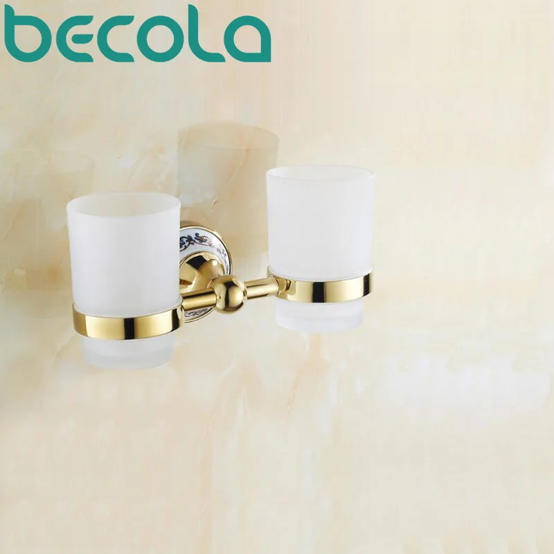 BECOLA керамический + стекло + латунные аксессуары для ванной комнаты, Позолоченные Двойные держатели для стаканчиков, держатель чашки для зуб...
BECOLA керамический + стекло + латунные аксессуары для ванной комнаты, Позолоченные Двойные держатели для стаканчиков, держатель чашки для зуб...