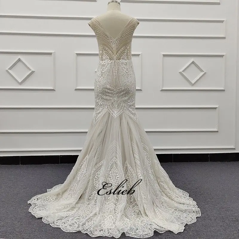 Eslieb 2019 zhongshan hot sale puffy satin beaded Sleeveless champagne arabic wedding dress mermaid vestito da sposa SJ038
Eslieb 2019 zhongshan hot sale puffy satin beaded Sleeveless champagne arabic wedding dress mermaid vestito da sposa SJ038