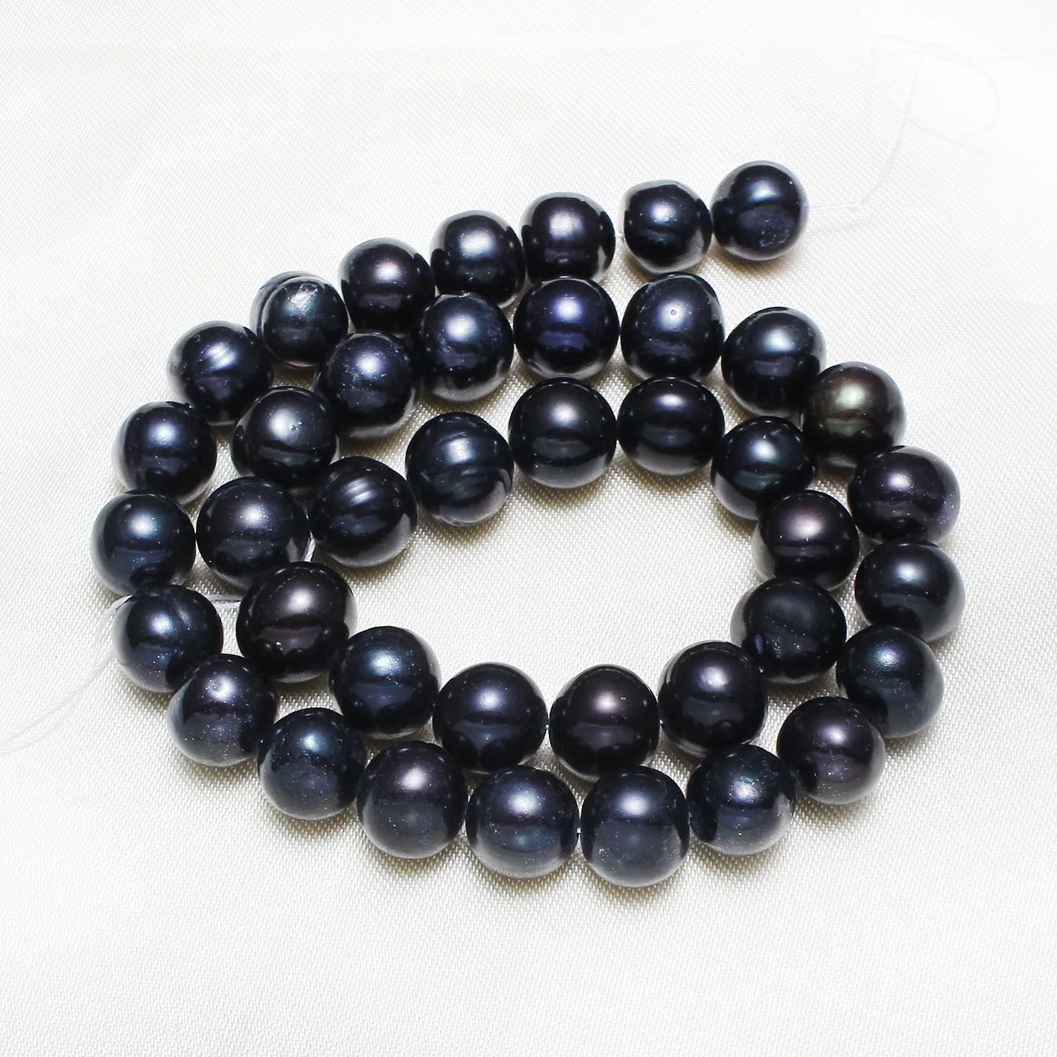 Cultured Potato Freshwater Pearl Beads Natural Black Grade A 9-10mm Approx 0.8mm Sold Per Approx 15 Inch Strand
Cultured Potato Freshwater Pearl Beads Natural Black Grade A 9-10mm Approx 0.8mm Sold Per Approx 15 Inch Strand