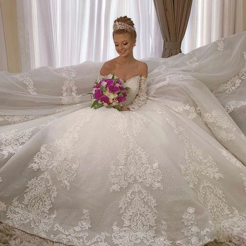 Luxury Off the Shoulder Ball Gown Wedding Dresses Lace Appliques Sequined Bridal Gown Puffy Skirt Chapel vestido de novia 2021
Luxury Off the Shoulder Ball Gown Wedding Dresses Lace Appliques Sequined Bridal Gown Puffy Skirt Chapel vestido de novia 2021