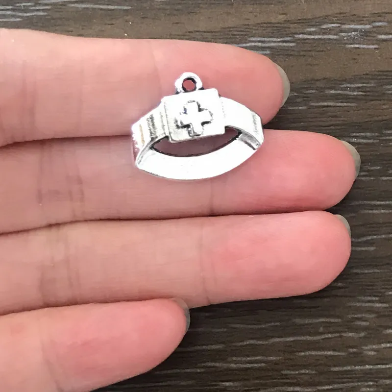 12PCS DIY Charm Nurse Hat Charm Zinc Alloy Pendant Charm for Bracelet Necklace Earring Zipper Pulls Bookmarks Jewelry Making
12PCS DIY Charm Nurse Hat Charm Zinc Alloy Pendant Charm for Bracelet Necklace Earring Zipper Pulls Bookmarks Jewelry Making