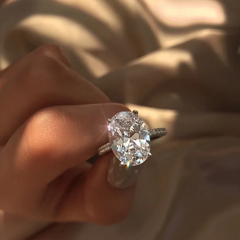 Luxury Female Crystal White Zircon Stone Ring Fashion Silver Big Rhinestones Shiny Finger rings Women Engagement Wedding Jewelry
Luxury Female Crystal White Zircon Stone Ring Fashion Silver Big Rhinestones Shiny Finger rings Women Engagement Wedding Jewelry