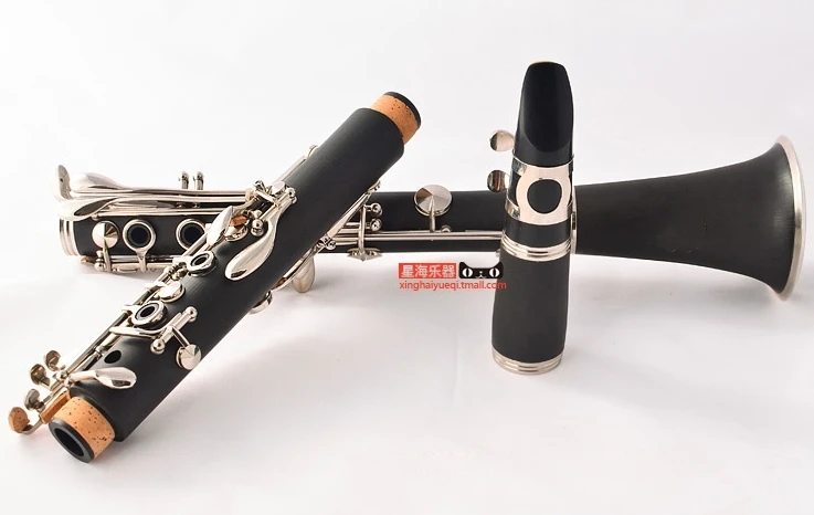 Hard Rubber Clarinet Bb Nickel plated 17keys Clarinet wind instruments with case musical instruments
Hard Rubber Clarinet Bb Nickel plated 17keys Clarinet wind instruments with case musical instruments