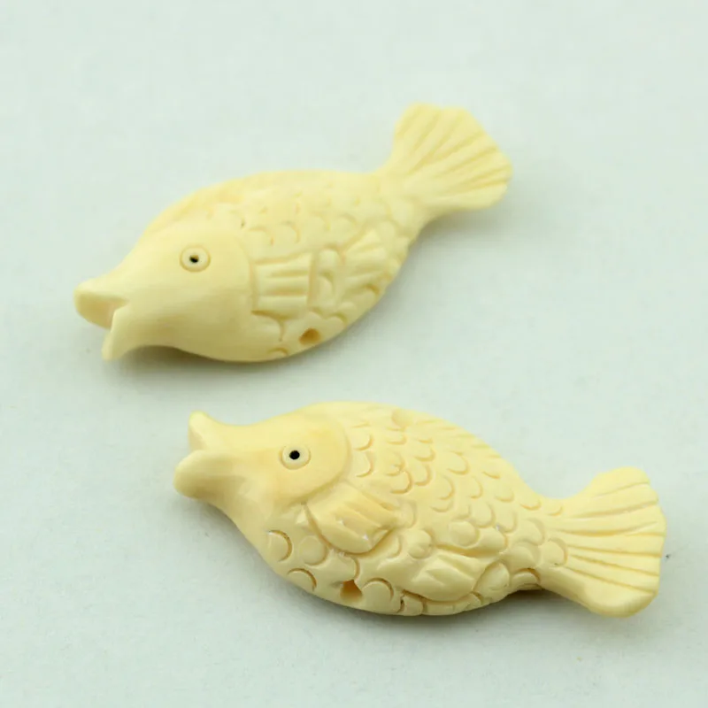 Natural Bovine Bone Fish Hand-carved dice beads Pendant for Necklace and Bracelet 4pcs/lot 42*19mm
Natural Bovine Bone Fish Hand-carved dice beads Pendant for Necklace and Bracelet 4pcs/lot 42*19mm