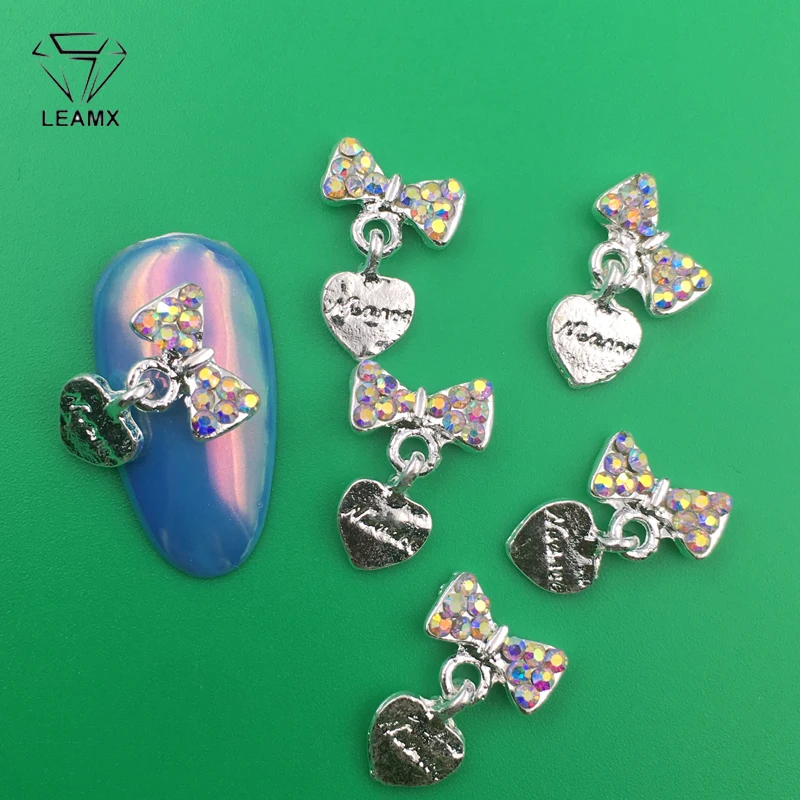 LEAMX 10 PCS/bag AB/Clear Rhinestones Nails Art Decorations 3D Bow With Heart Nail DIY Manicure Alloy Nail Charms Supply L414
LEAMX 10 PCS/bag AB/Clear Rhinestones Nails Art Decorations 3D Bow With Heart Nail DIY Manicure Alloy Nail Charms Supply L414