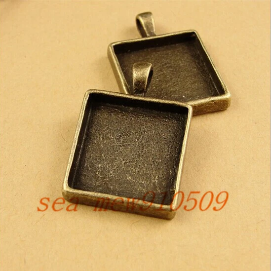 (60 pieces/lot) To fit 20mm square cabochon antique bronze plated vintage style alloy pendant tray settings hd1199 
(60 pieces/lot) To fit 20mm square cabochon antique bronze plated vintage style alloy pendant tray settings hd1199