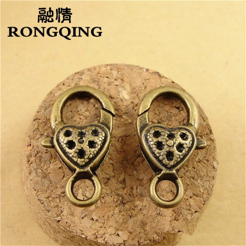 RONGQING 40pcs/lot Hollowed Love Heart Decorative Pattern Jewelry Findings 22*27MM Lobster Clasps For Necklace Bracelet DIY
RONGQING 40pcs/lot Hollowed Love Heart Decorative Pattern Jewelry Findings 22*27MM Lobster Clasps For Necklace Bracelet DIY