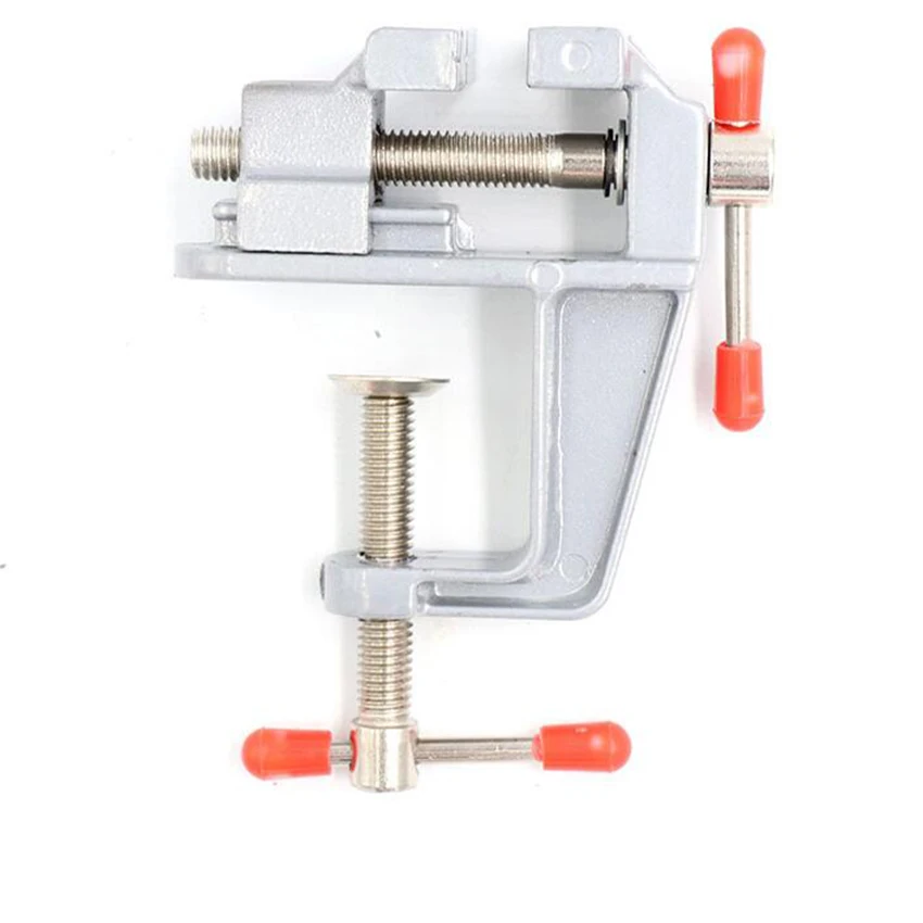 Mini Table Vise Aluminium Alloy Bench Swivel Lock Clamp Vice Craft Jewelry Hobby Vice for DIY Craft model Fixed Repair Tool
Mini Table Vise Aluminium Alloy Bench Swivel Lock Clamp Vice Craft Jewelry Hobby Vice for DIY Craft model Fixed Repair Tool