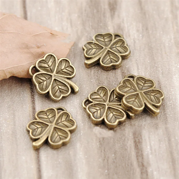 Hot selling 6 pieces/lot 13mm*11mm Antique bronze plated leaf charms four leaf clover charms for diy handmade pandents jewelry
Hot selling 6 pieces/lot 13mm*11mm Antique bronze plated leaf charms four leaf clover charms for diy handmade pandents jewelry