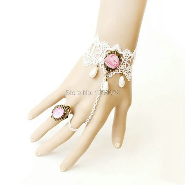 Gothic Lolita Pink Rose Charm White Lace Bracelet with Ring Chain Graduation Party Hand Accessories Latin Dance Wear for Women
Gothic Lolita Pink Rose Charm White Lace Bracelet with Ring Chain Graduation Party Hand Accessories Latin Dance Wear for Women