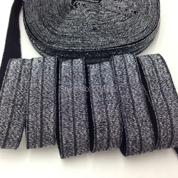 10yards/lot 5/8" Black Silver Metallic Fold Over Elastic Silver Sparkling Glitter FOE Ribbon for DIY Headwear Hair Accessories
10yards/lot 5/8" Black Silver Metallic Fold Over Elastic Silver Sparkling Glitter FOE Ribbon for DIY Headwear Hair Accessories