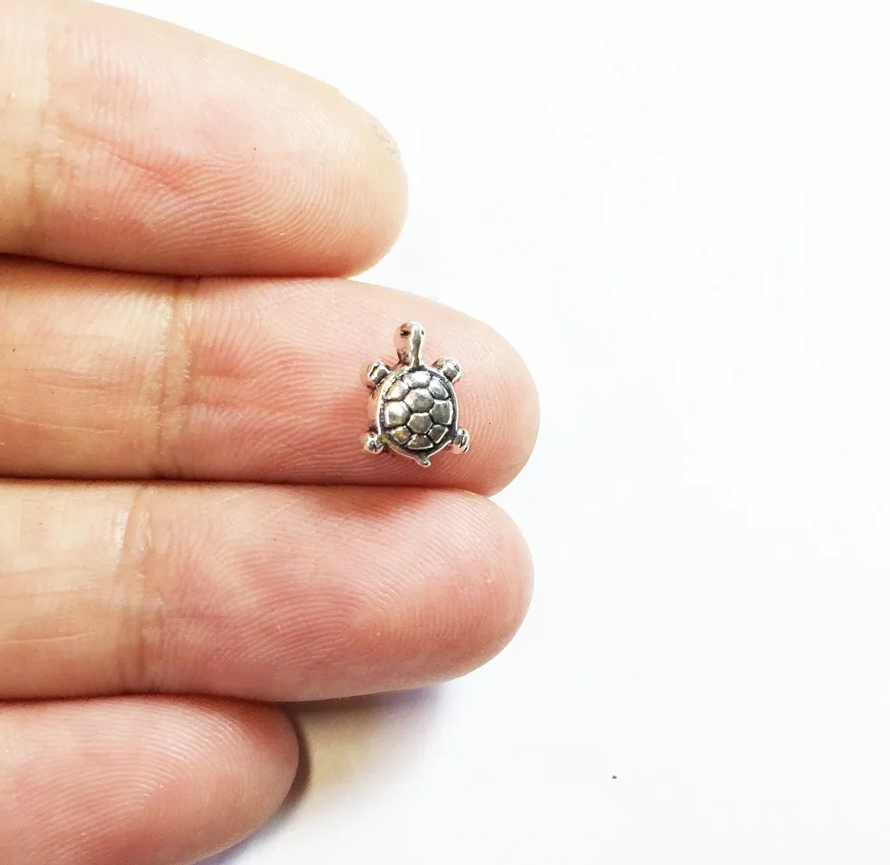 

Eruifa 30pcs 8mm Mini Tortoise Burnished silver Zinc alloy Beads Charms Pendant Jewelry DIY Handmade Bracelet