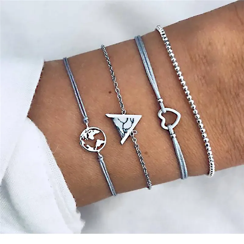 pack of 4 inspired bangle bracelet with hollow heart /map and faux stone triangle design in mixed link chains
pack of 4 inspired bangle bracelet with hollow heart /map and faux stone triangle design in mixed link chains