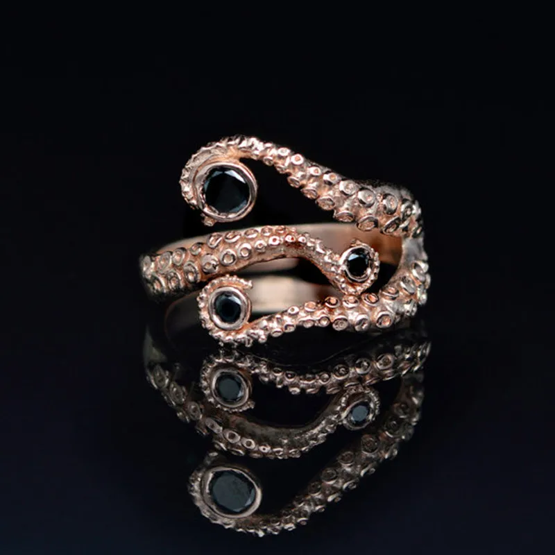 Tentacle Ring Band Octopus Ring Seductive Tentacle Ring in Rose Gold Plating and Black Rhinestone by Octopus adjustable size
Tentacle Ring Band Octopus Ring Seductive Tentacle Ring in Rose Gold Plating and Black Rhinestone by Octopus adjustable size