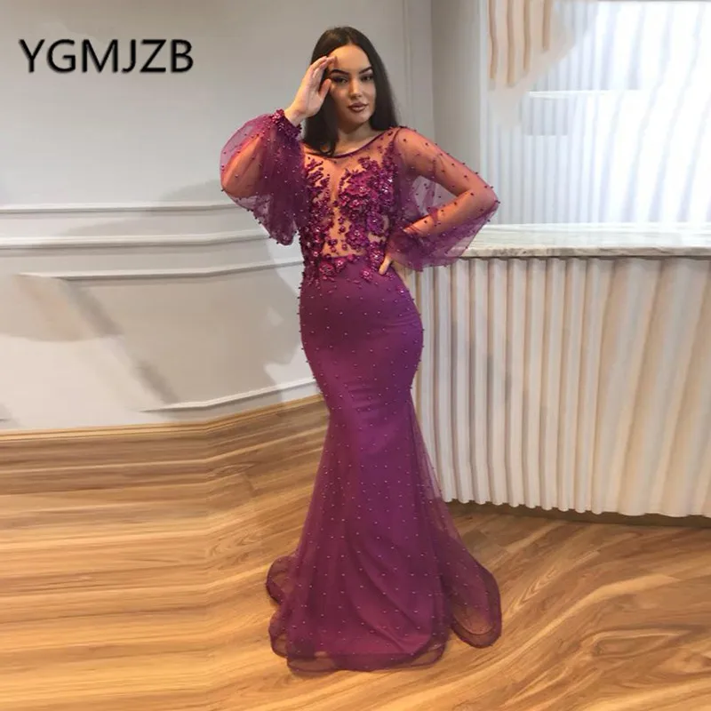 Long Mermaid Evening Dresses 2019 Illusion Puffy Long Sleeves Pearls 3D Flowers Saudi Arabic Women Formal Prom Gown Party Dress
Long Mermaid Evening Dresses 2019 Illusion Puffy Long Sleeves Pearls 3D Flowers Saudi Arabic Women Formal Prom Gown Party Dress