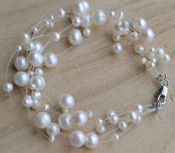 Stunning Pearl Jewelry, 3-8MM 8 Inch 9Rows White 100% Real Freshwater Pearl Bracelet,Natural Pearl Beads Fashion Women's Jewelry
Stunning Pearl Jewelry, 3-8MM 8 Inch 9Rows White 100% Real Freshwater Pearl Bracelet,Natural Pearl Beads Fashion Women's Jewelry