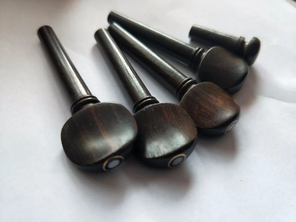 Fiddle parts 1 set Ebony Violin pegs natural color from 1/4 to 4/4 including 4 pegs and 1 end button
Fiddle parts 1 set Ebony Violin pegs natural color from 1/4 to 4/4 including 4 pegs and 1 end button