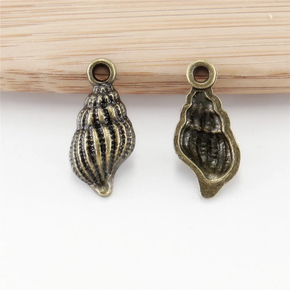 Wholessale 100pcs/lot antique bronze charms conch pendants for DIY metal jewelry making
Wholessale 100pcs/lot antique bronze charms conch pendants for DIY metal jewelry making