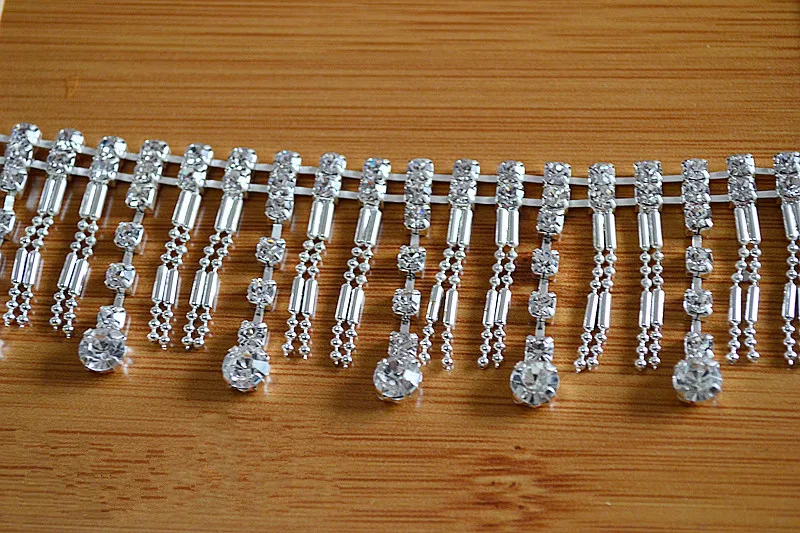 New style hand sewing wedding dresses tassel lace trim drill Silver chain belt diamond lace fabric DIY accessories
New style hand sewing wedding dresses tassel lace trim drill Silver chain belt diamond lace fabric DIY accessories
